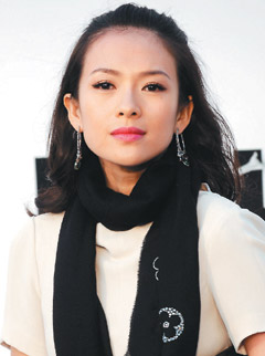 章子怡回北京开工 对在海滩被偷拍感到很愤怒