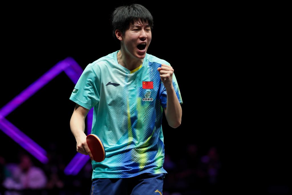 3月14日，温瑞博在比赛中庆祝得分。新华社记者 黄伟 摄